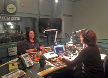 ATCJS Director Anna Shternshis and Carol Off having a discussion in a broadcasting studio